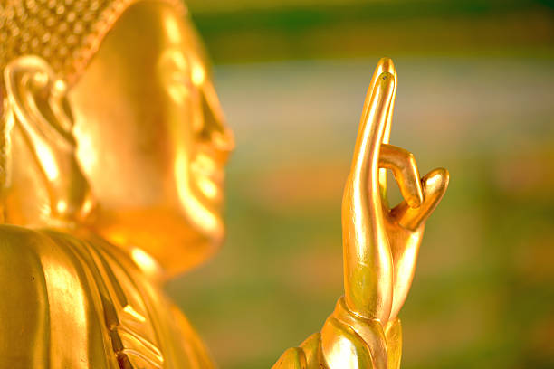 istock Buddha hand gold close-up 186400081