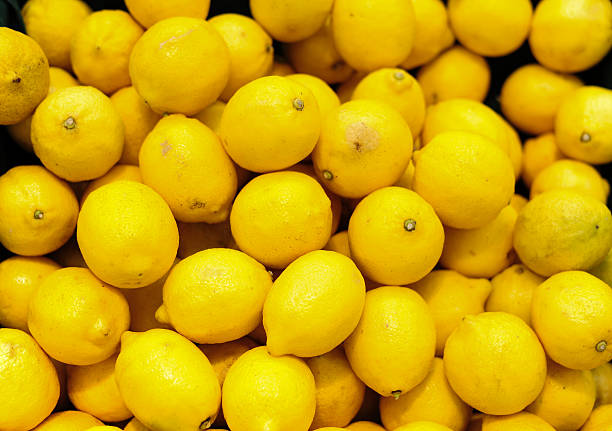 istock Colorful Lemons In Market 186400503
