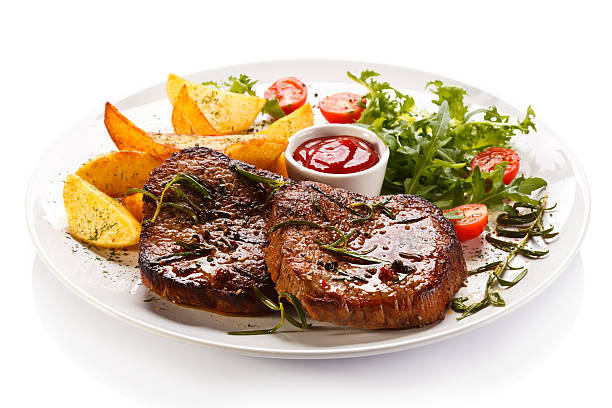 istock Grilled meat, potatoes and vegetables 186400704