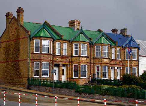 Port Stanley, East Falkland, Falkland Islands: Jubilee Villas - terrace of red brick houses built in 1887 to commemorate the Golden Jubilee of Queen Victoria - Ross Road, on the waterfront,