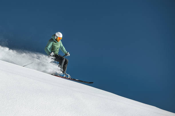 istock Sporty man skiing 1864054392