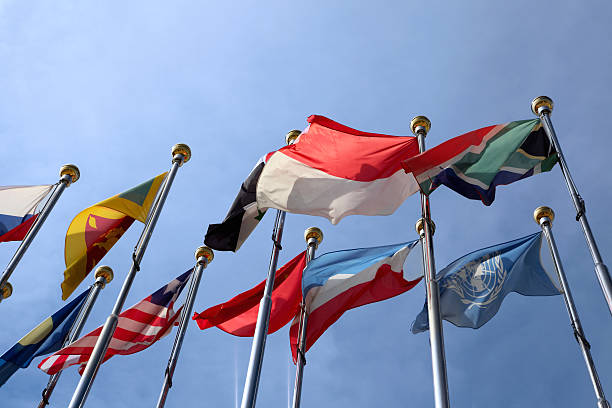 istock Different countries flags united together against blue sky 186409704