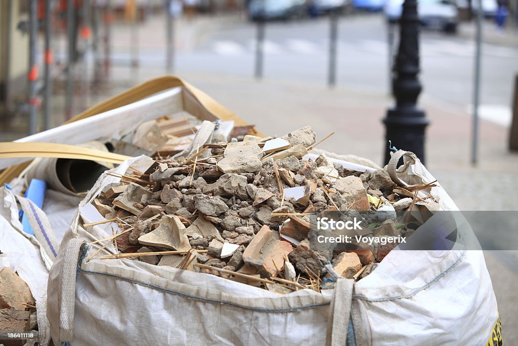 Full construction waste debris bags Full construction waste debris bags, garbage bricks and material from demolished house Bag Stock Photo