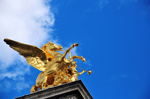 Paris, France: Alexandre III bridge - sculpture of Pegasus held by the Fame of Combat (1897), sculptor Pierre Granet - photo by M.Torres