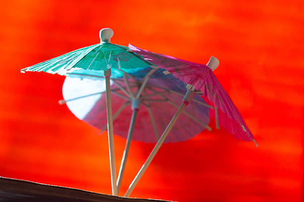 guarda-sóis para um coquetel - drink umbrella umbrella parasol small group of objects - fotografias e filmes do acervo