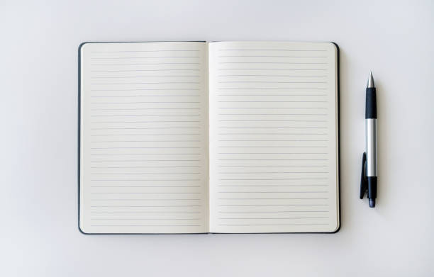 Top view of opened blank notebook on table for mockup White plain diary or blank journal for writing memo, note and message diary-top-view stock pictures, royalty-free photos & images