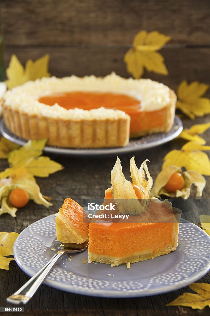 Pumpkin pie with swirls of whipped cream Autumn Stock Photo