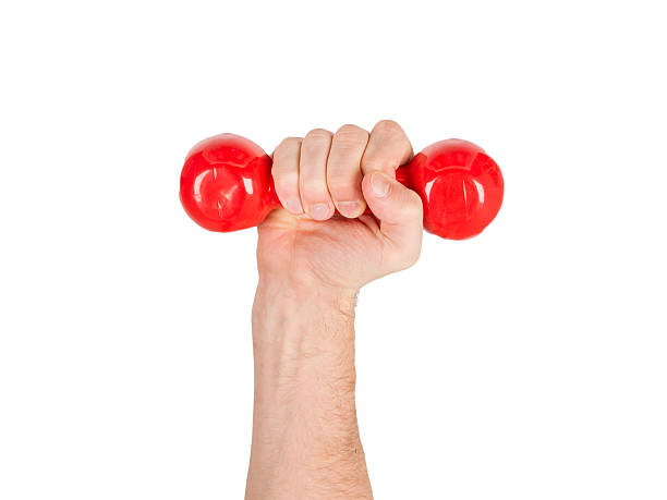 istock Red dumbbells in the hands of a man, isolated 186411767