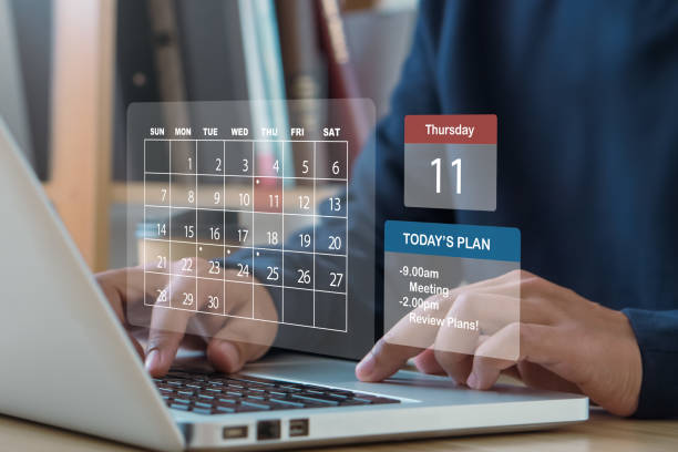 istock Time management concept.2024 Calendar event planner.Businessman manages time for Work planning increases efficiency.Highlight appointment reminders and meeting agendas. 1864125938