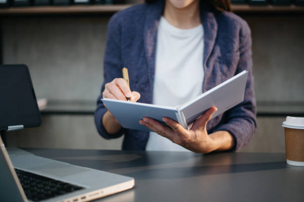 istock businesswoman hand working with new modern computer using on smartphone and tablet as concept 1864126539