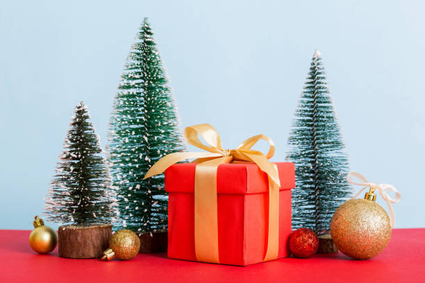 istock Christmas composition. craft Gift box, small tree, branches and craft DIY decorations on white background. New year concept. Christmas home decoration Flat lay, top view, copy space 1864128329