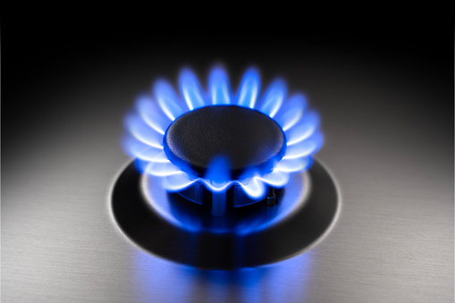 Close-up on a gas stove at a commercial kitchen