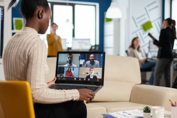 istock African manager woman discussing with remote colleagues 1864142071