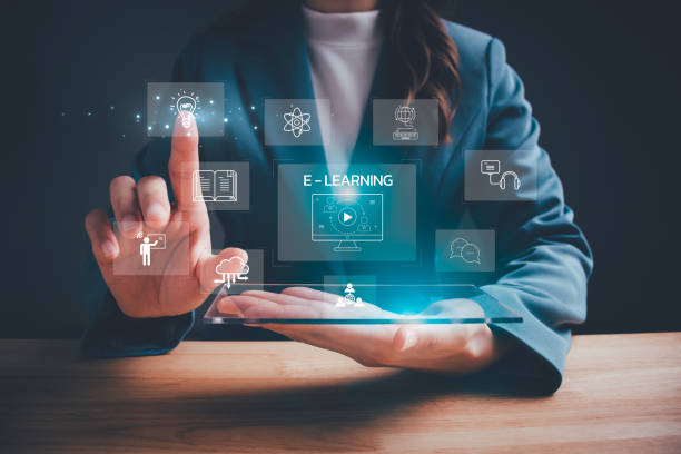 istock Woman with virtual screen of training online or E-learning. Internet education course, webinar online, digital courses develop skills thinking idea. E-learning graduate certificate program by video. 1864147347
