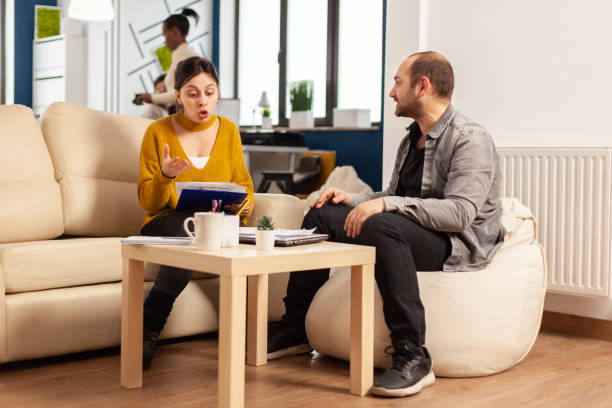 istock Angry manager woman screaming at man employee 1864178294