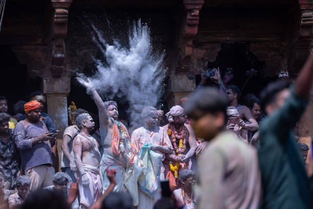 People celebrating masan holi at manikarnika ghat in varanasi stock photo