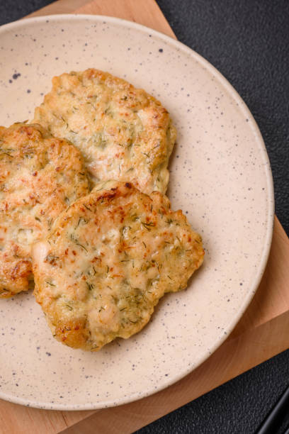 istock Delicious fresh fried minced fish cutlets with spices and herbs 1864193673