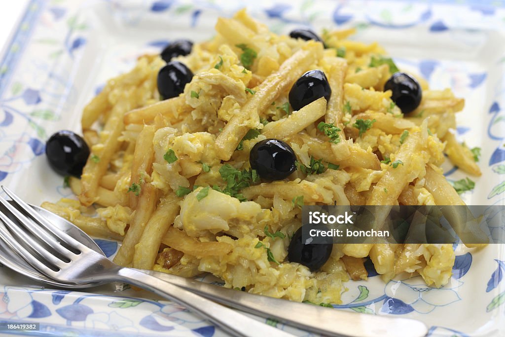 Close-up plate of Portuguese cuisine called Bacalhau a bras bacalhau a bras, Portuguese cuisine, a dish with salt cod, potatoes and eggs Cod Stock Photo