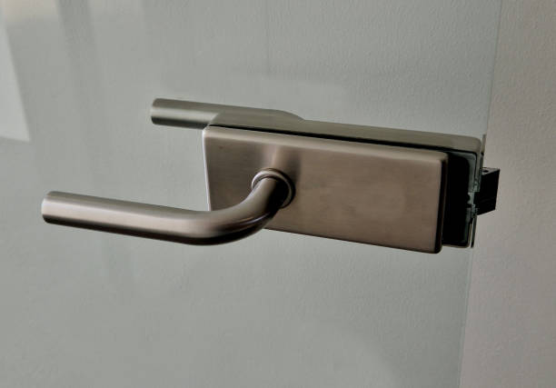 istock frameless glass door. glazed partitions have special hinges and handles. everything is drilled into the glass and attached with stainless steel screws. polished bar handle 1864201625