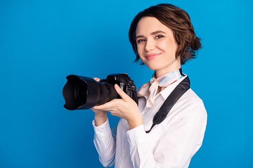Profile photo of adorable satisfied person smile look camera tied on neck scarf isolated on blue color background