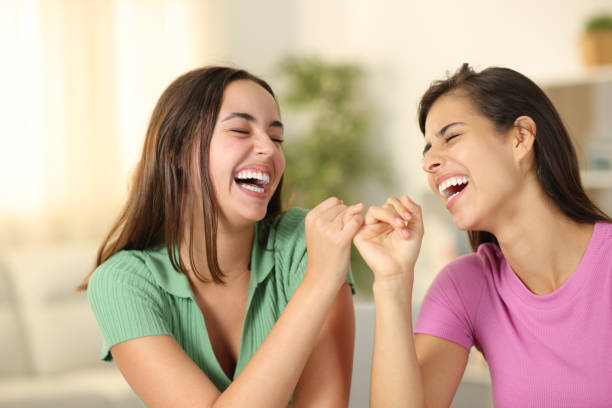 istock Two roommates making pinky promise at home 1864241048