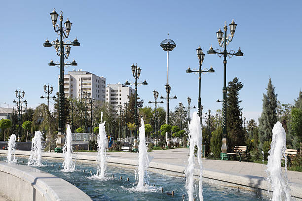 istock Fountain, lampposts and some living building. Ashkhabad. 186424213