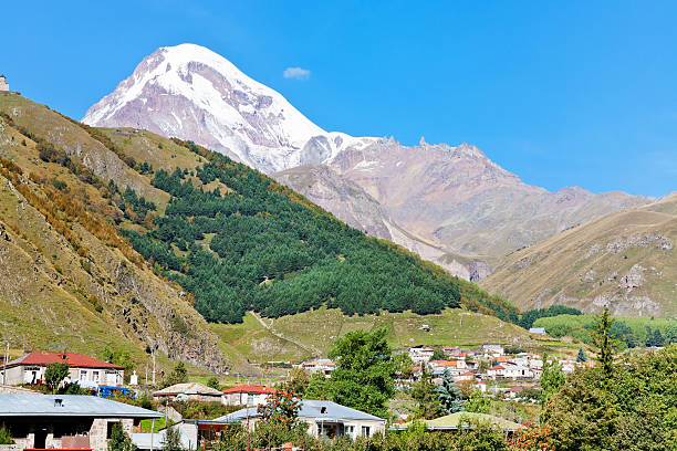 istock village Stepantsminda and Mount Kazbek in Georgia 186427438