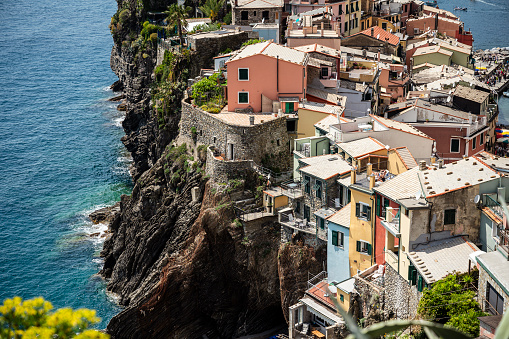 View of the small village of Vernazza on the Ligurian coast, which is one of the five centuries-old villages of the Cinque Terre in summer.