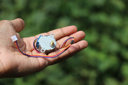 Stepper motor used in hobby electronic projects held in hand