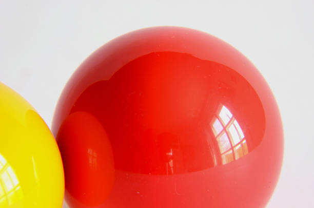 istock yellow and red billiard balls 186429981