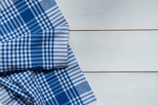checked tablecloth on wooden