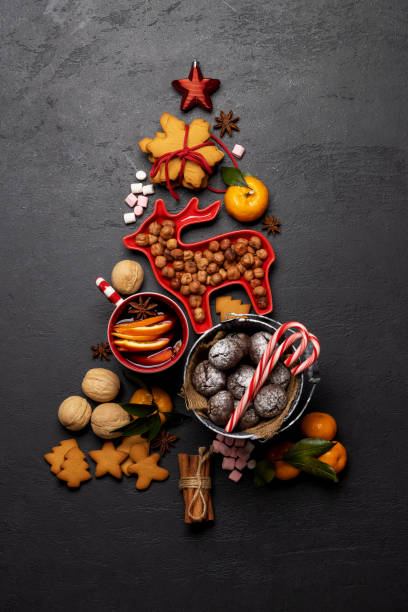 istock Christmas tree-shaped cookies, mulled wine, and decor 1864309586