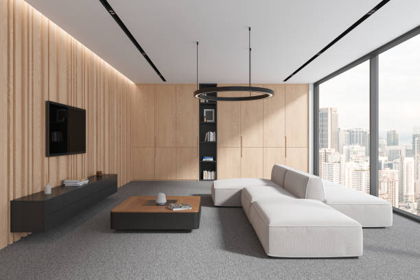 istock Wooden home living room interior with couch and tv console, panoramic window 1864338332