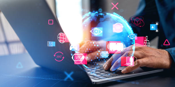 istock Businessman typing in computer, virtual reality icons and metaverse 1864338342