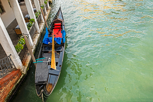 Venetian canal b in Venice with a boat. view from above