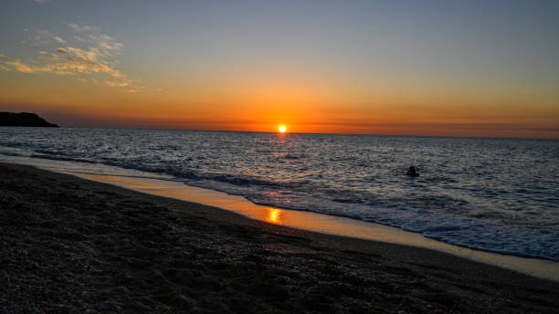 istock Beautiful high resolution panoramic red colored sunset on the Mediterranean beach- Israel 1864345320