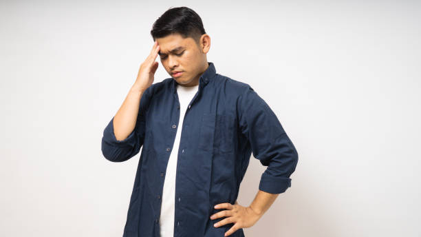 istock Asian young man got Headache 1864349994