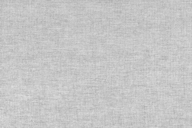 istock Textile background, white coarse fabric texture, cloth structure, jacquard woven upholstery 1864374423