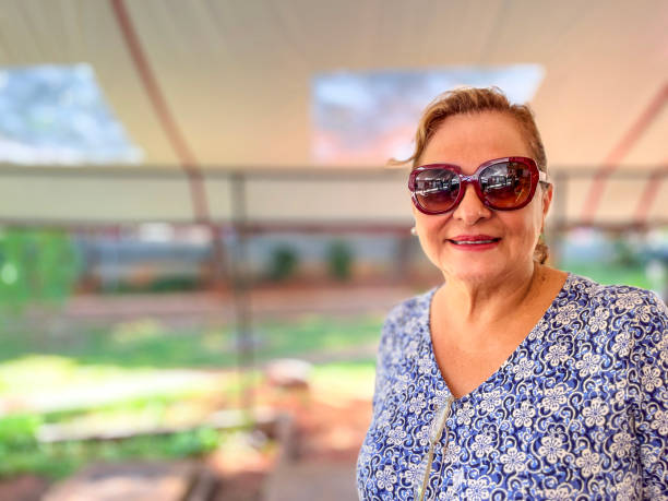 Attractive senior Hispanic woman headshot