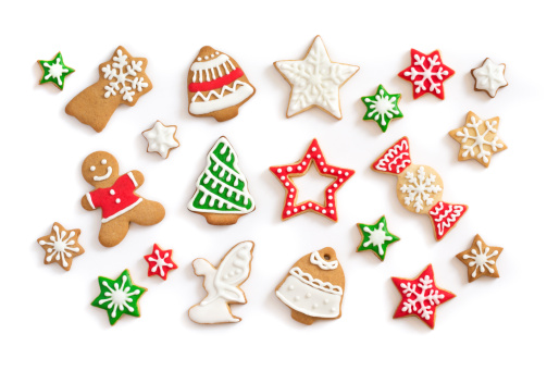 Gingerbread cookies on white background. Snowflake, star, man, angel, candy shapes.