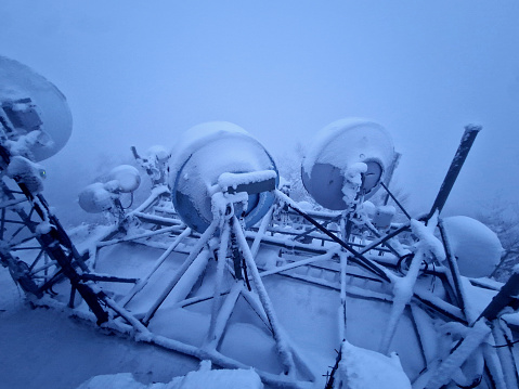 water reservoir has transmitters and amplifiers and gsm antennas on top of the roof covered with snow. frosted and covered with ice may stop working properly.