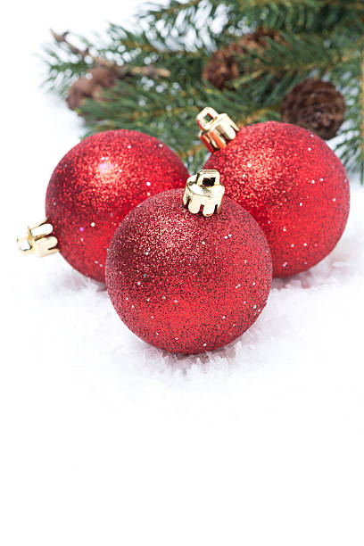 istock composition with red shiny christmas balls, isolated 186442351