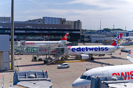 Parked Swiss airplane Airbus A321-212 registration HB-IOO at Zürich Kloten Airport on a sunny summer day. Photo taken July 23rd, 2023, Zurich, Switzerland.