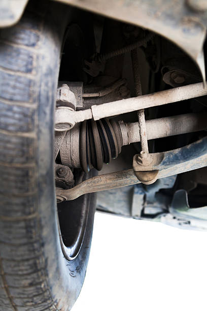 inspection of car suspension inspection of car suspension at auto station car hoister stock pictures, royalty-free photos & images