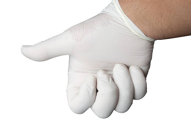 istock Hand wearing rubber glove 186446674