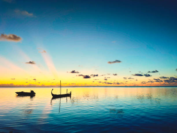 At the ocean in sunset on sunny Maldive island.