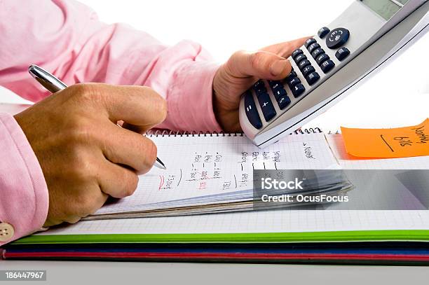 Calculating Monthly Costs Stock Photo - Download Image Now - Adhesive Note, Adult, Calculator