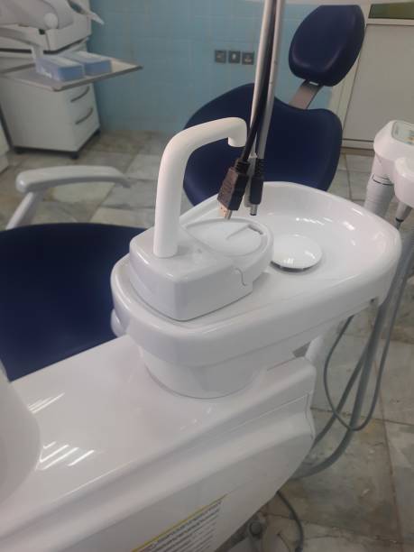 istock White and blue dentist chair, close view 1864501255