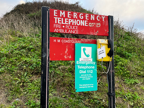An out of order emergency phone on the north Norfolk coast. December 2023