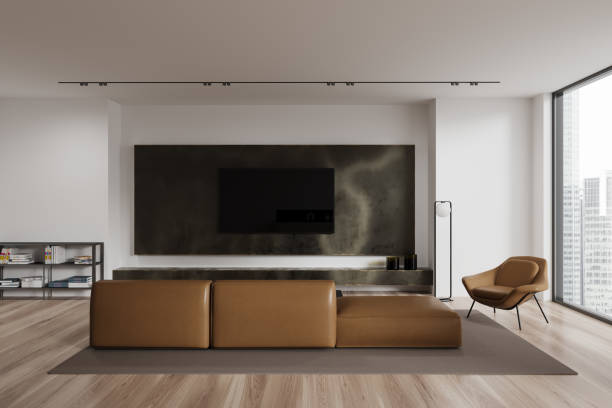 istock White living room interior with sofa and TV 1864549012
